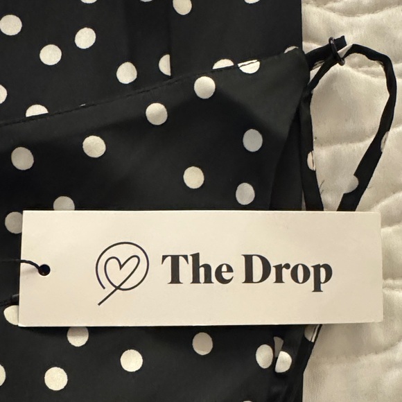 Elegant Black and White Polka Dot Midi Dress - Picture 7 of 9